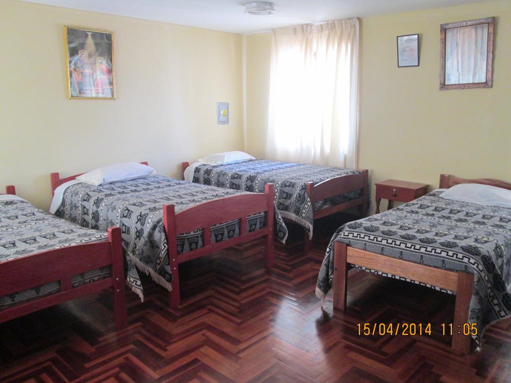 Hostal Santa Rosa Куско Номер фото