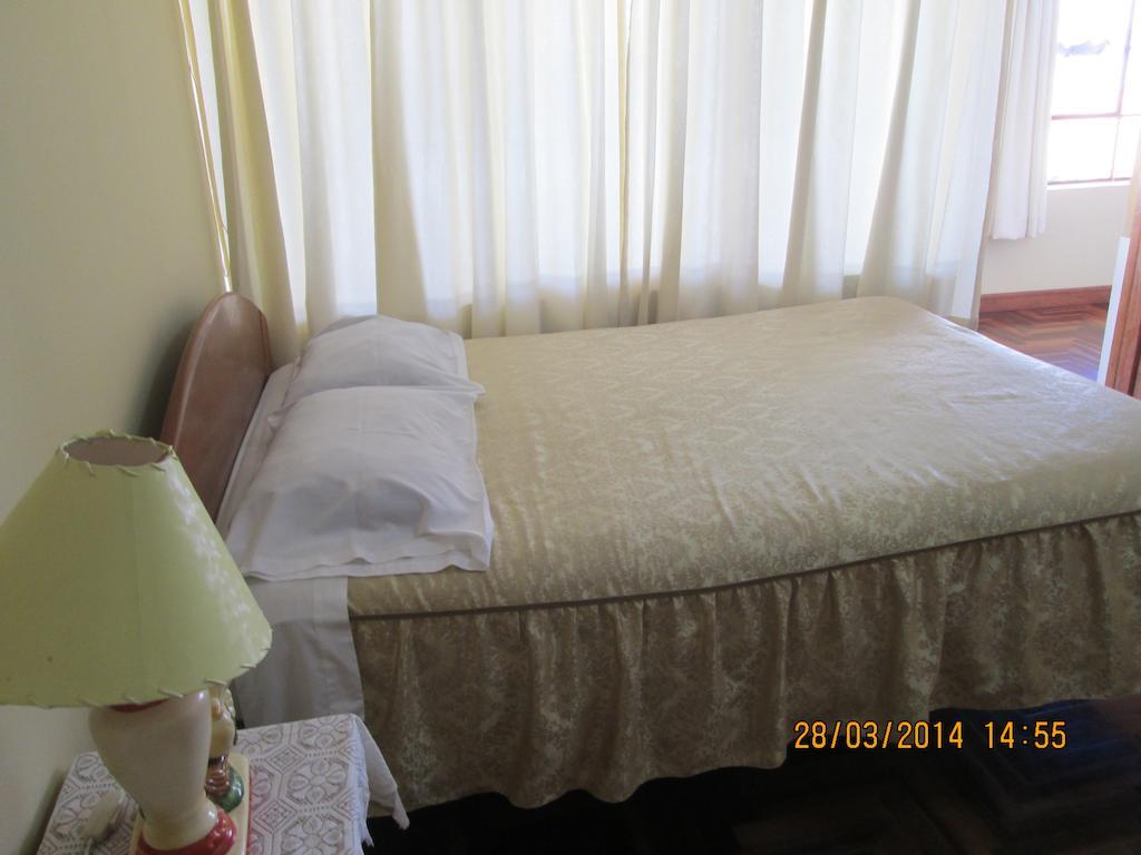 Hostal Santa Rosa Куско Номер фото