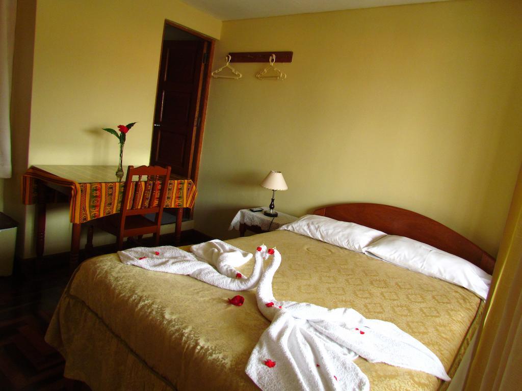 Hostal Santa Rosa Куско Номер фото